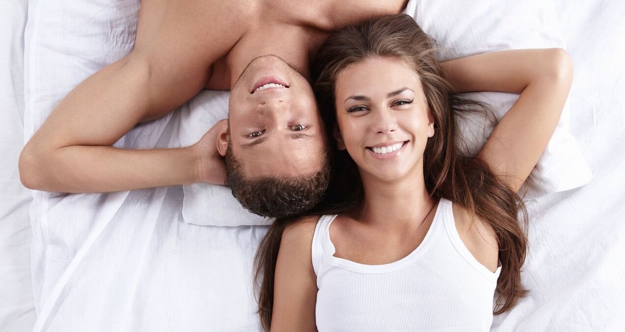woman in bed with a man who increased his potency