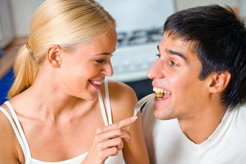 a woman gives the man products to stimulate his potency